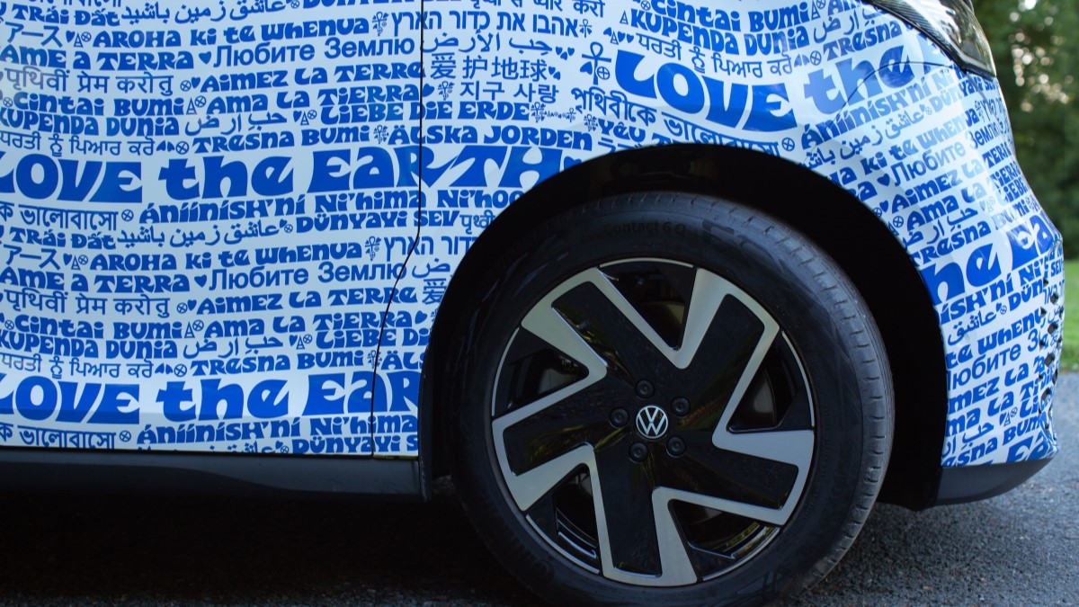 A detail photo of the 2025 Volkswagen ID.Buzz in a wrap by artist Bob Hieronymous.