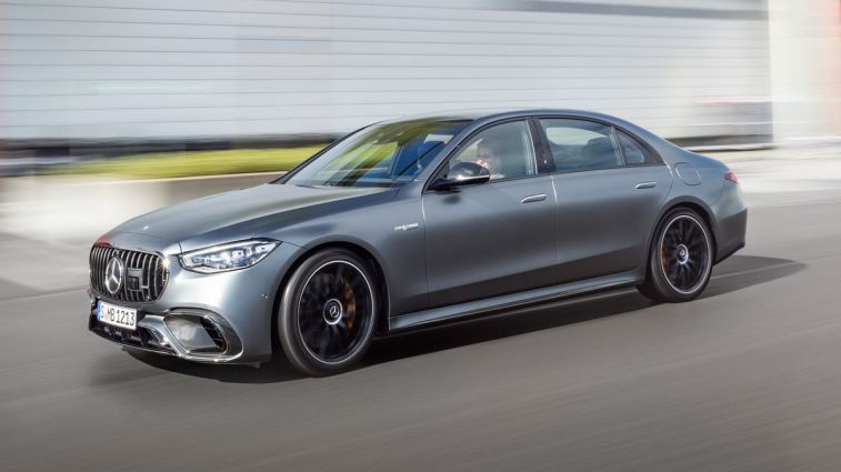 2024 Mercedes-AMG S 63 E PERFORMANCE driving on a road.