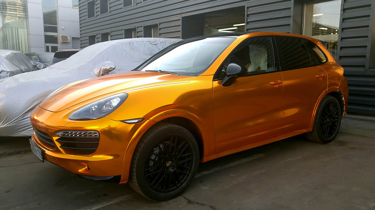 Porsche Cayenne with gold-colored vinyl wrap.