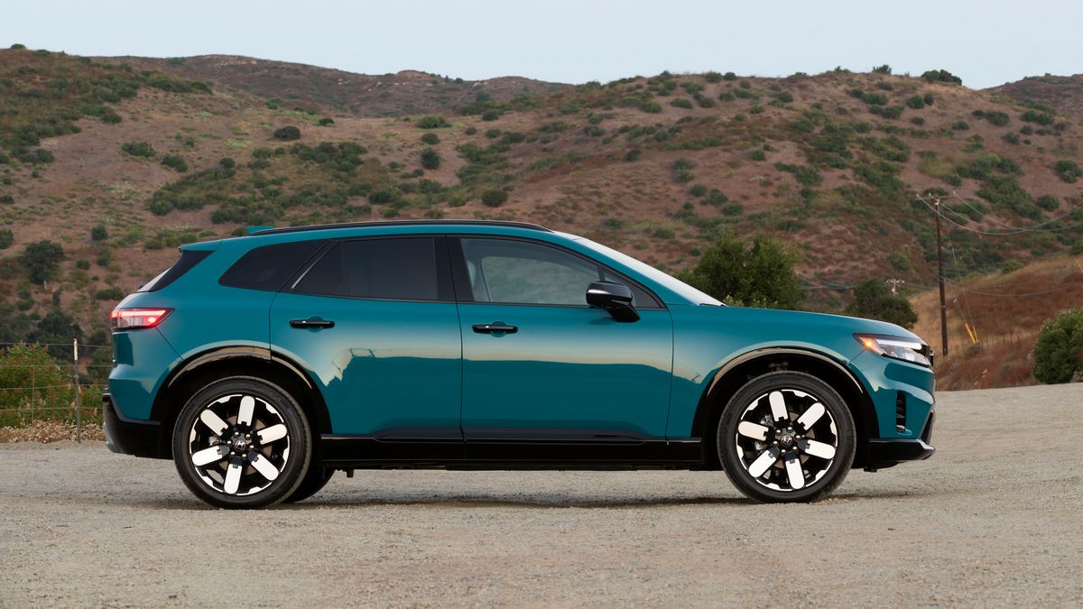 2024 Honda Prologue in North Shore Pearl with hills in the background.