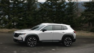 The 2025 Mazda CX-50 Hybrid seen in profile