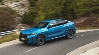 The 2024 BMW X6 seen from a front quarter angle