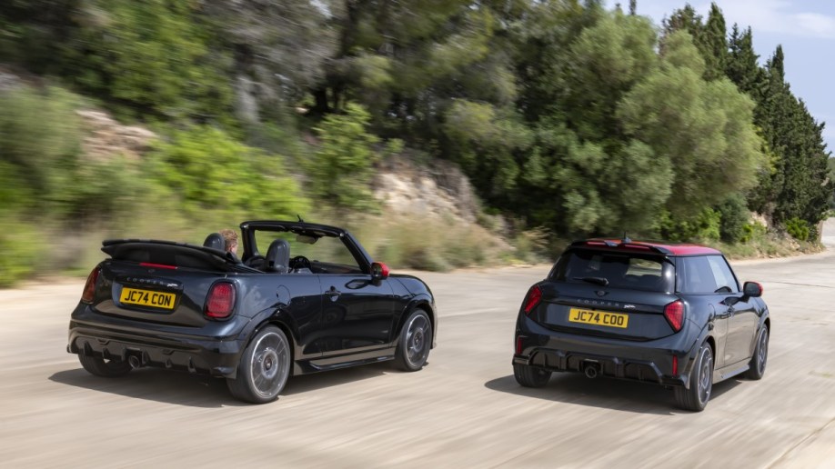 The 2025 Mini John Cooper Works hardtop and convertible models side by side, seen from a rear quarter angle