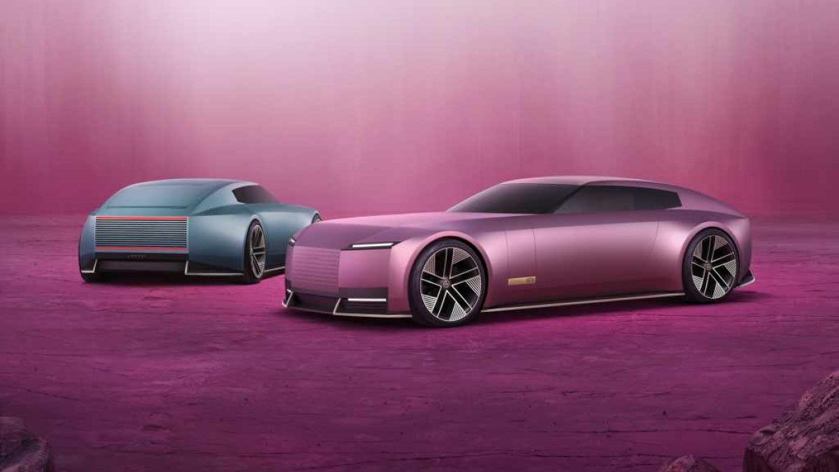 A pair of Jaguar Type 00 Concepts seen from the front and rear quarter angles