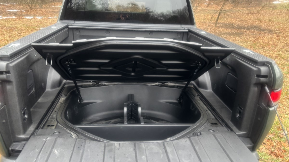 The storage beneath the bed in the 2025 Rivian R1T