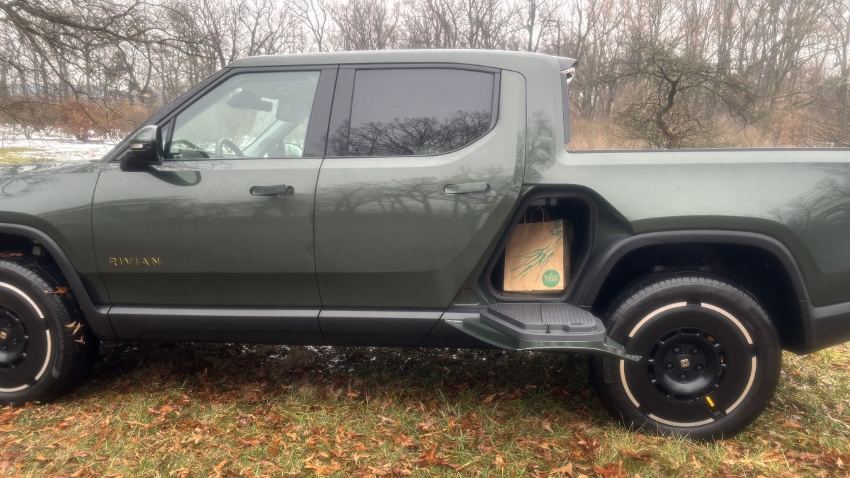 The 2025 Rivian R1T with its gear tunnel open