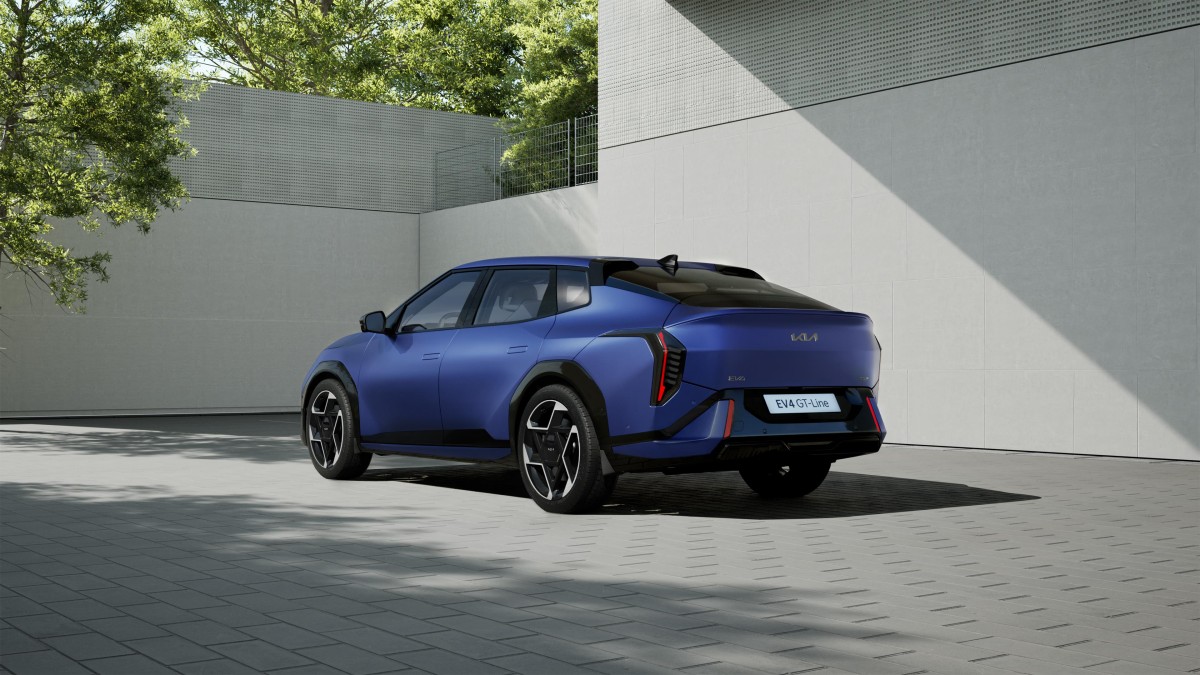 The 2026 Kia EV4 seen from a rear quarter angle