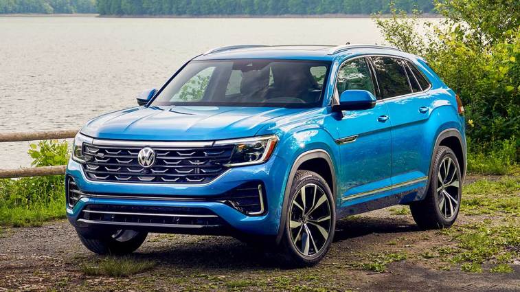 2025 Volkswagen Atlas Cross Sport parked near a river.