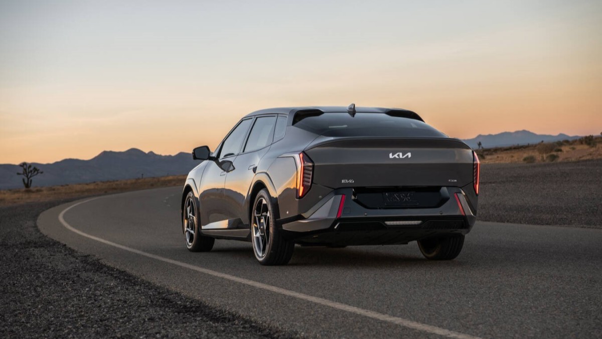 The 2024 Kia EV4 seen from a rear quarter angle