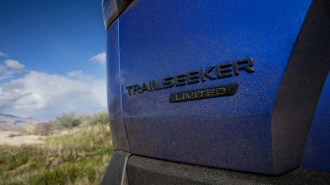 A teaser photo showing the badge of the 2026 Subaru Trailseeker