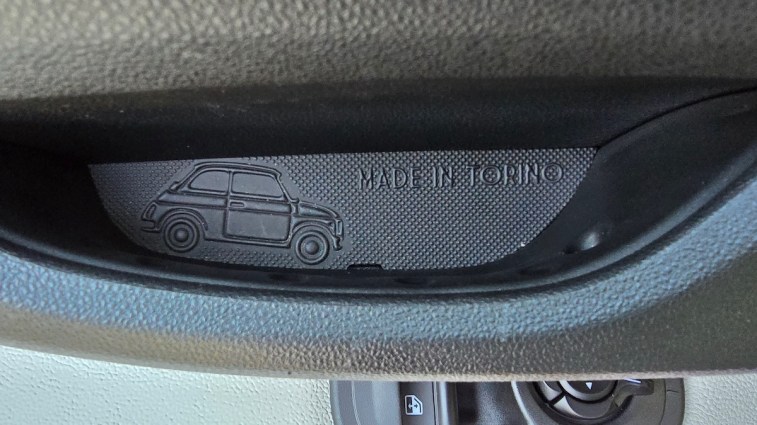 "Made in Torino" Easter egg in the door pull of a 2024 fiat 500e.