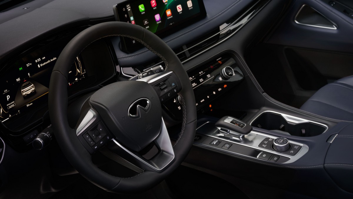 The blue-and-black interior of the 2026 Infiniti QX60 Sport