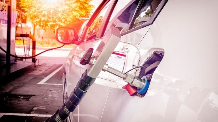 A natural gas vehicle refueling.