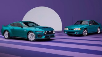 The 2026 Ford Mustang with the FX Package parked with the Fox Body Mustang that inspired it