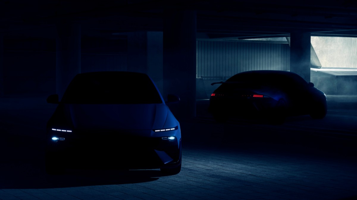 A teaser photo showing the 2026 Hyundai Ioniq 6 N from the front and rear in heavy shadow